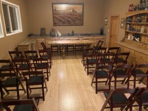 Trek Wine private tasting room set up with chairs and a table for a private event in Downtown Novato