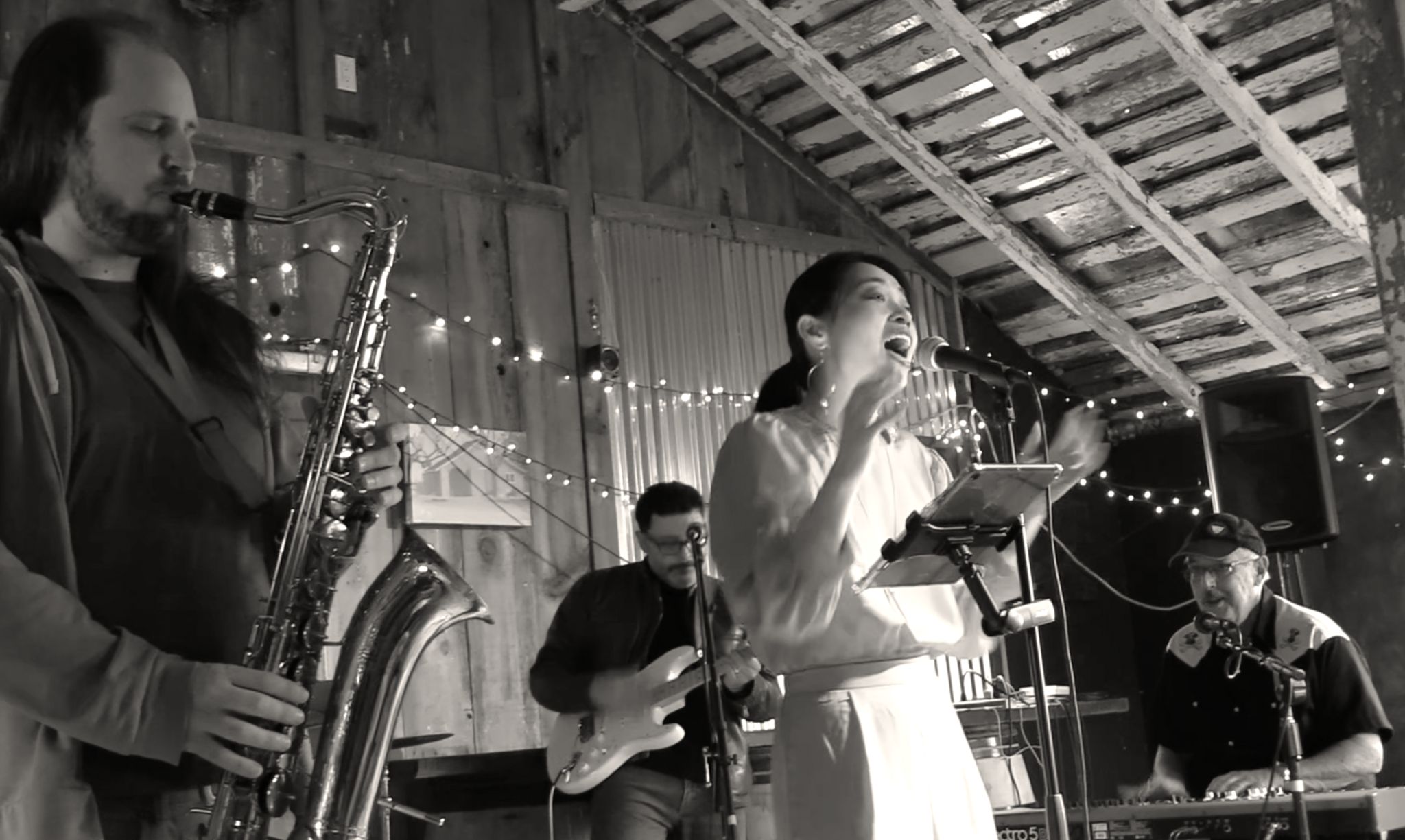 CozyCats band performing live in a barn