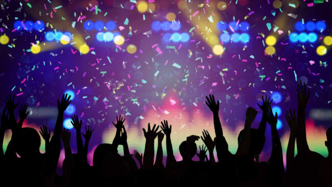 Abstract Party Background - Crowd People Enjoy Dancing and Show Hands Up in the Concert with Beautiful Lighting and Laser