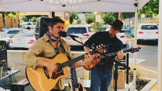 Live music by Joe Brennan singing and playing guitar.