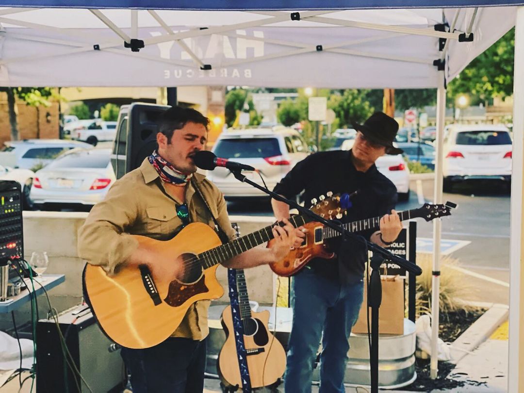 Live music by Joe Brennan singing and playing guitar.