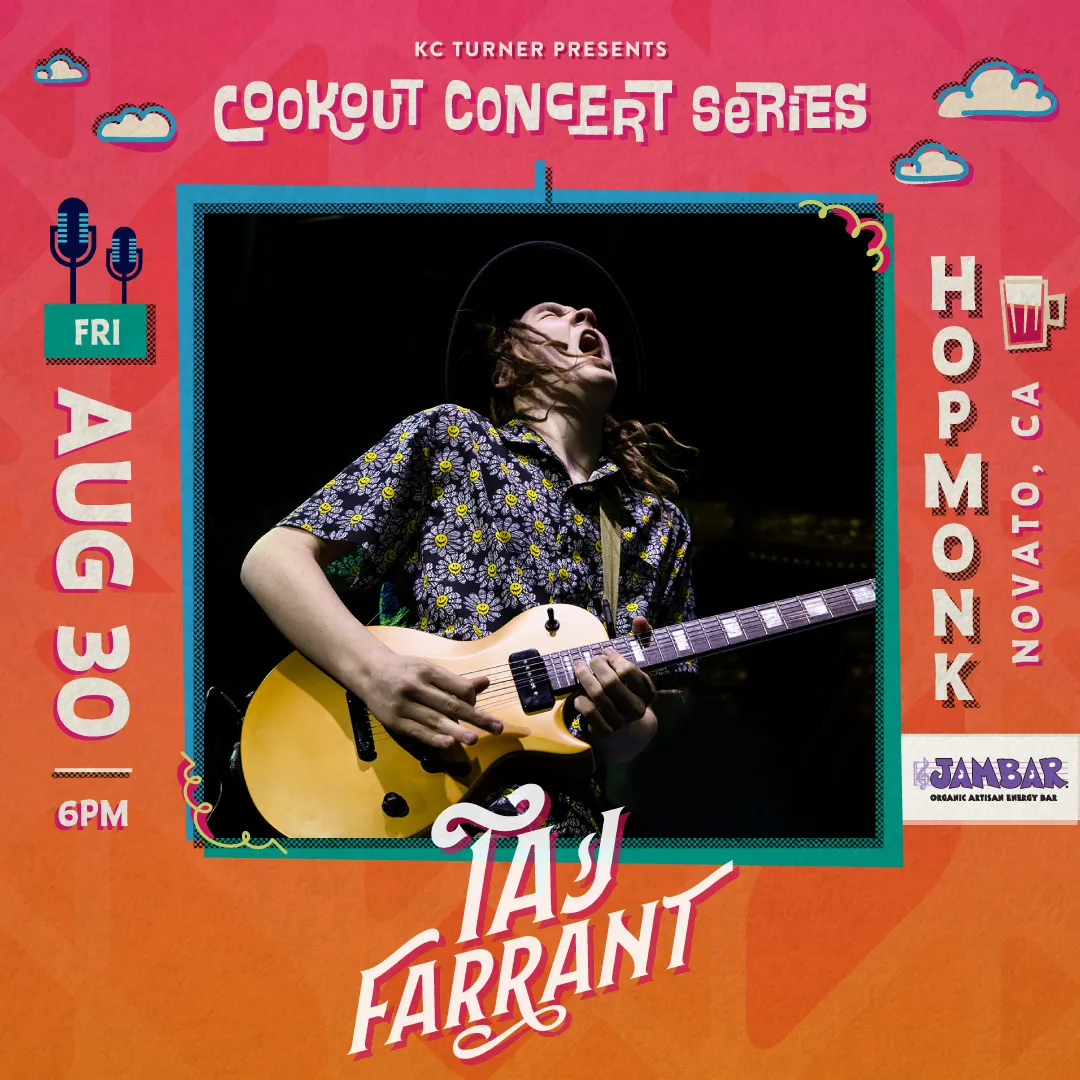 Taj Farrant playing guitar live on stage